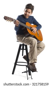 Child Playing Guitar On Chair