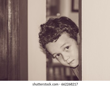 child playing hide and seeks
