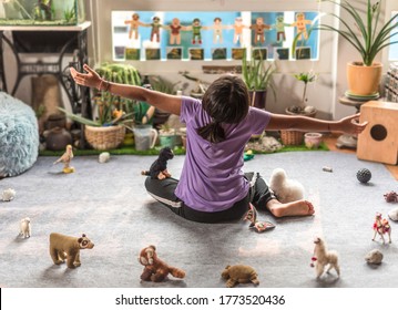 Child Playing At Home Creating A Personal Space To Dance And Express Himself Surrounded By A Circle Of His Toys