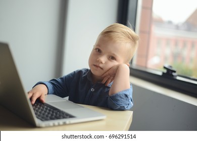 Child Playing On Laptop