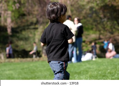 child playing on lawn