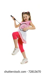 a child playing a racket for a badminton
