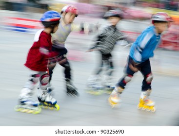 child playing rollerblade blur motion