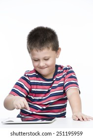 child playing with tablet