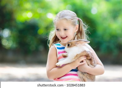 Child Playing Rabbit Little Girl Feeding Stock Photo 1034032591 ...