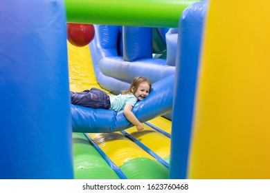 Child plays fun in the entertainment center. Game center - Shutterstock ID 1623760468