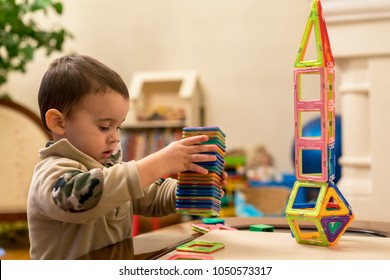 The Child Plays With A Magnetic Constructor Toys.