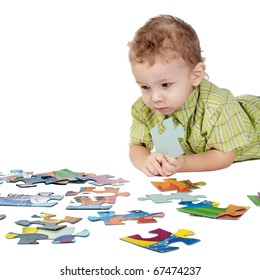 child plays with puzzles