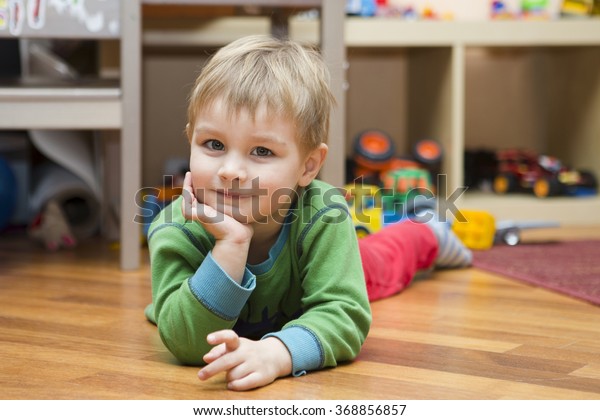 the child plays in the\
room