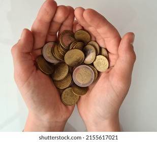 Child With Pocket Money In Hands. Poverty And Misery In Europe. Child Expenses And Earnings Concept