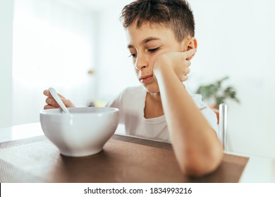 Child With Poor Appetite During The Meal. Concept Of Lack Of Appetite.