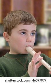 Child Practicing Recorder