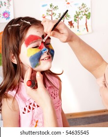 Child Preschooler With Face Painting. Make Up.