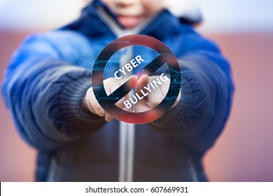 Child Pressing Cyberbullying Stop Symbol On Virtual Touch Screen. Cyberbullying Awareness.