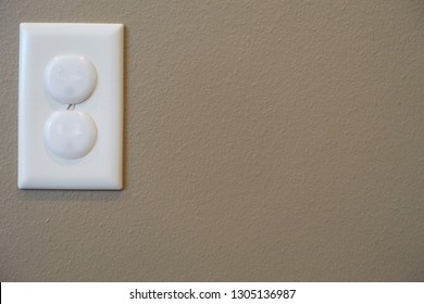 Child Proofed Covered Electrical Outlet	                               