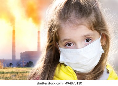 Child In Protective Mask On Industrial Plant Smoke Background.Atmosphere Pollution.Factory Smog Influence On People Health Concept.