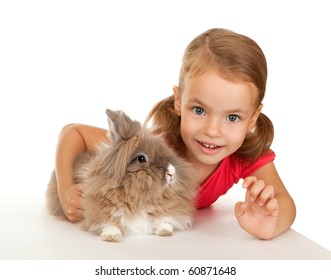 Child With A Rabbit. In The Oriental Calendar 2011 - The Year Of Rabbit.