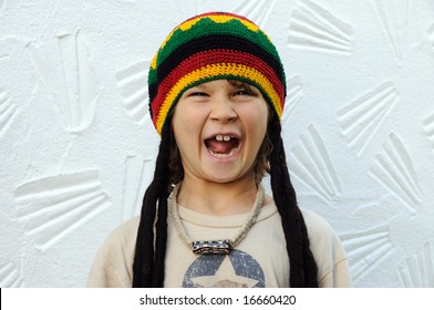 Child With A Rasta Hat