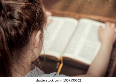 Child Reading Book Bible