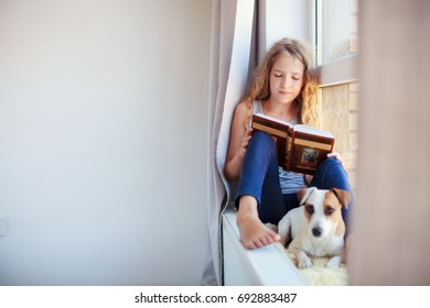 Child Reading Book Home Girl Sitting Stock Photo 692883487 | Shutterstock