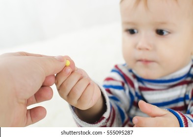 The Child Receives The Vitamins