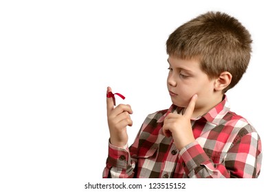 Child With A Red Bow On Finger To Not Forget Things