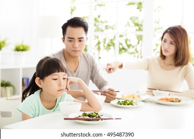 Child Refuses To Eat While Family Dinner 