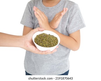 Child Refusing To Eat Green Beans, Food Allergy Concept. Closeup Photo, Blurred.