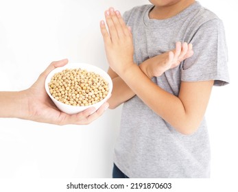 Child Refusing To Eat Soy, Food Allergy Concept. Closeup Photo, Blurred.
