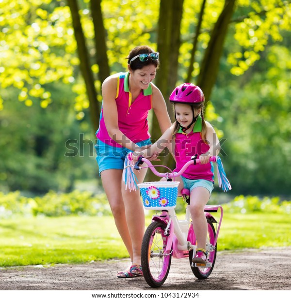 child riding bicycle