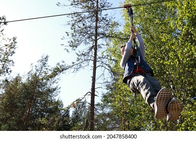 Child Rolls On Zipline At Gora Filina, Karelia