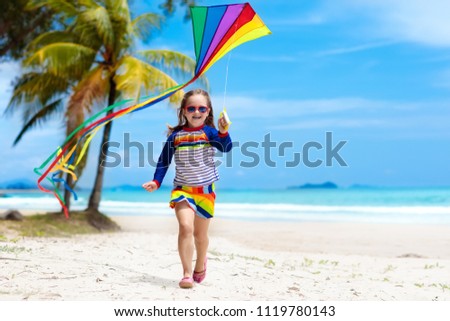 Image, Stock Photo Flying rainbow kites coast