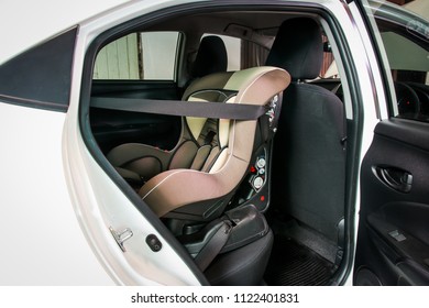 Child Safety Car Seat Installation Inside Rear Seat.