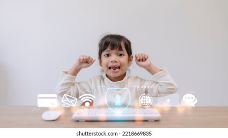 Child Safety Online. Little Girl Using Laptop At Home. Icon Of Internet Blocking App On Foreground