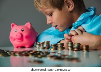 Child Saving Money, Boy Put Coins Into Piggy Bank