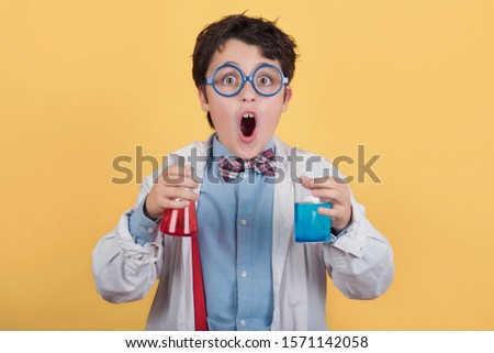 Similar – boy is making science experiments