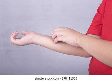 Child Scratch The Itching Skin. Concept Of Dermatitis Allergy Mosquito Bite.