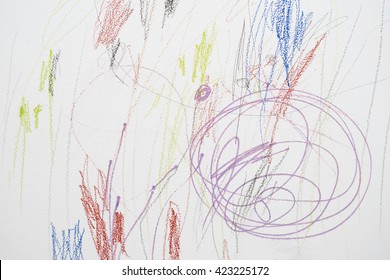 Child scribble on the wall/colored pencils scribbles on a white wall made by a little kid that could pass as abstract work.