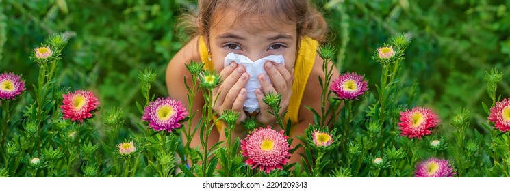 The Child Is Seasonal Allergy To Flowers. Selective Focus. Kid.