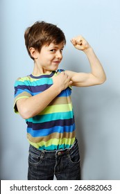 2,596 Kids showing muscles Images, Stock Photos & Vectors | Shutterstock