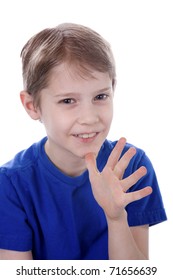 A Child Signs Mom In American Sign Language