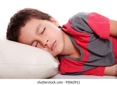 Child Sleeping On White Pillow And Empty Background, Studio Shoot