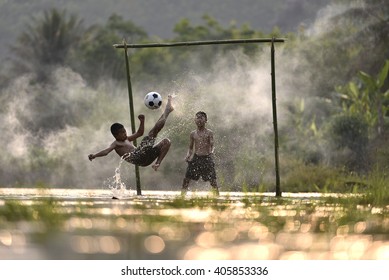 Child Soccer Ball Happy In Thailand.