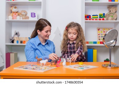 Child With Speech Therapist On Therapy