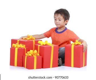 Child with stack gift box. Isolated in white background
