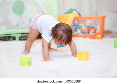 the child standing on hands and feet - Powered by Shutterstock