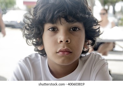 Child Staring At Camera