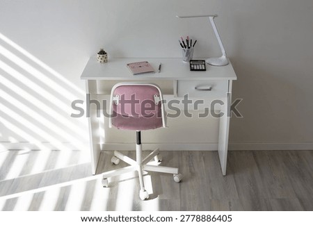 Child Study Corner with White Desk and Pink Chair