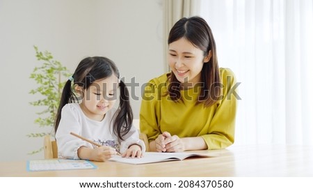 A Child studying in the living room