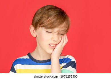 Child Suffer From Toothache. Anti Toothache Remedy. Toothache Painkiller. Dental Disease. Toothache As Dental Pain. Dentist Concept. Oral Care Concepts.